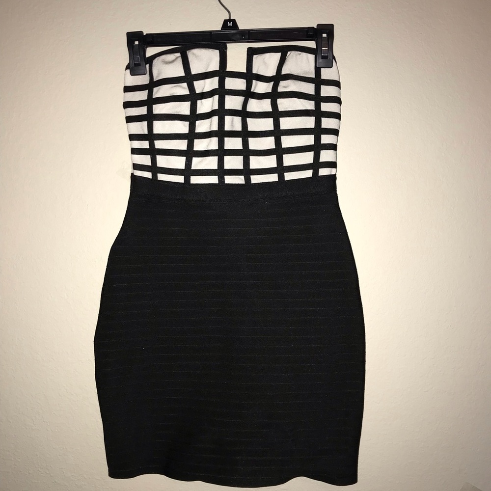 2b bebé black dress never worn but without tags.